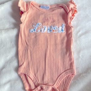 Used once Coral Rene Rofe onesie. Size 0-3months